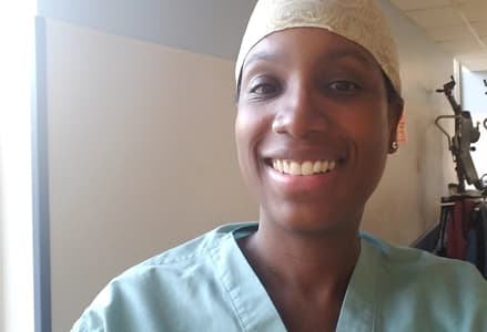 Dr. Jenn in her hospital scrubs